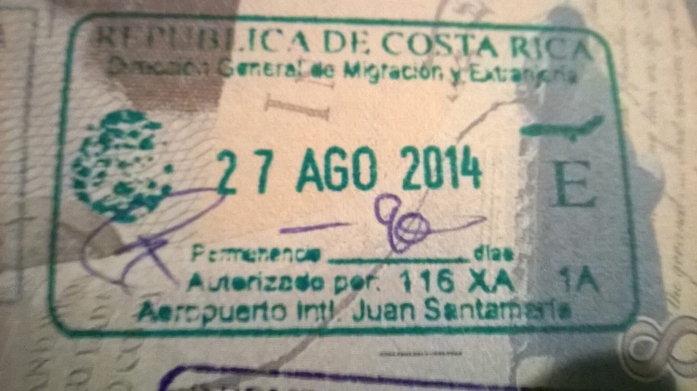 Costa Rica entry stamp in a passport showing the permanencia days line