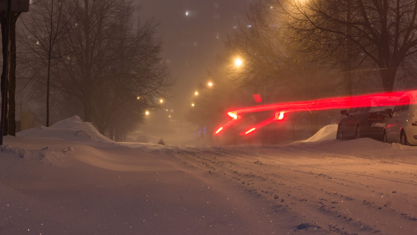 Snow covered residential street during a winter storm in Toronto, Canada