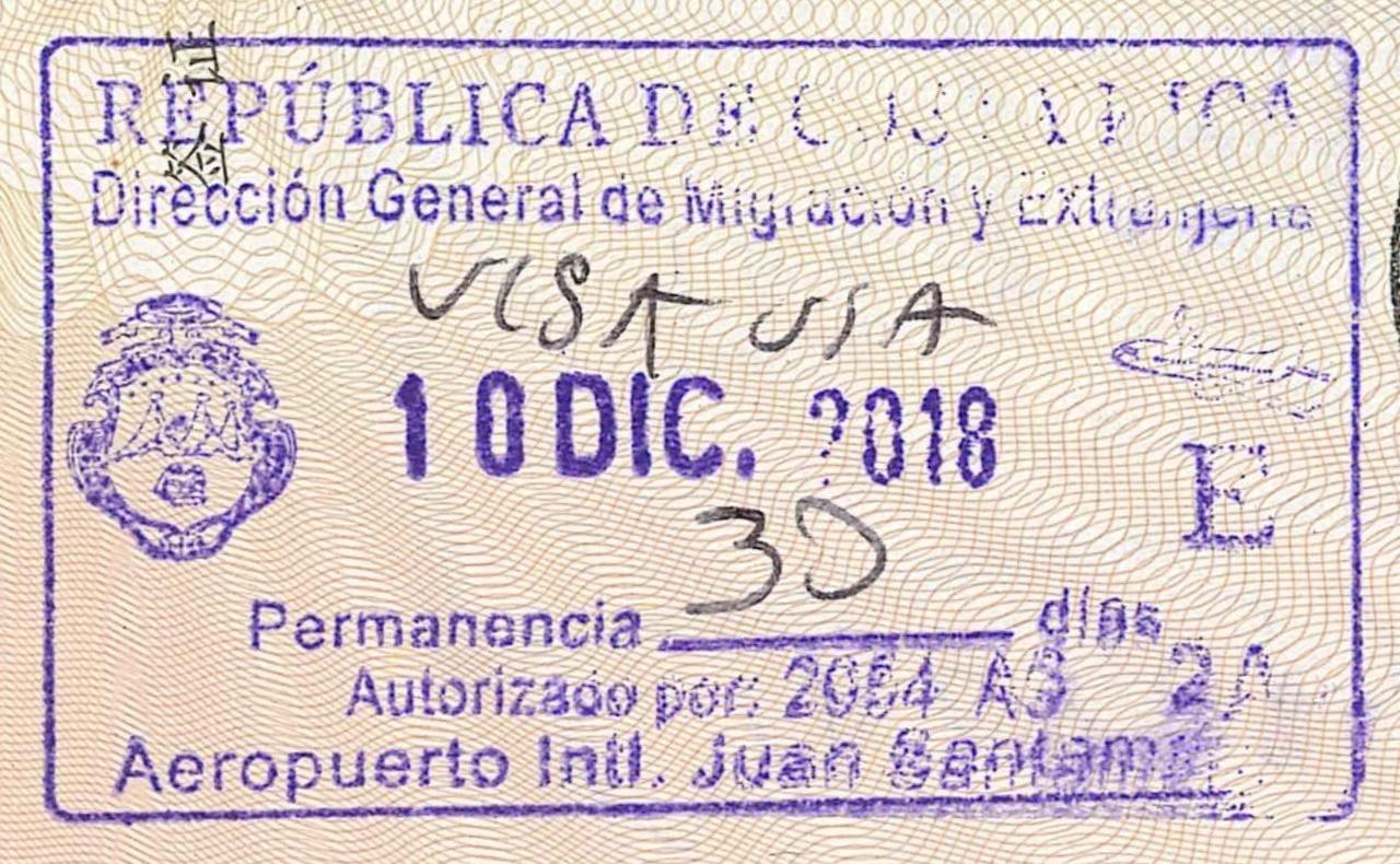Costa Rica immigration entry stamp with handwritten days inside a passport